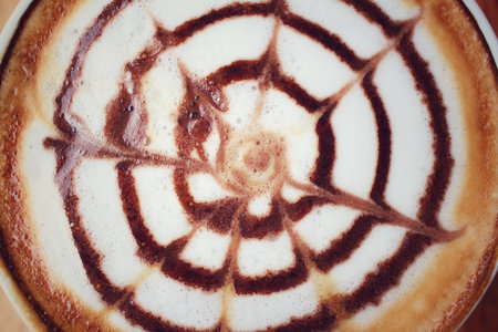 Vintage latte art coffeeの写真素材