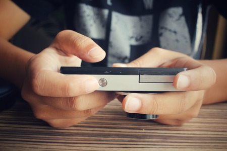 Woman using cameraの写真素材