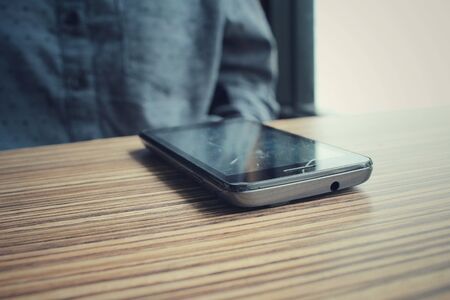 Woman with smart phoneの写真素材