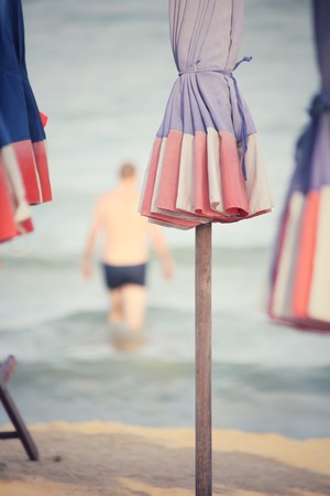 Beach chairs and umbrellaの写真素材