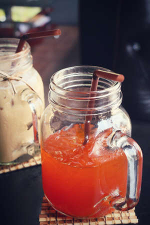 Iced coffee and tea at cafeの写真素材