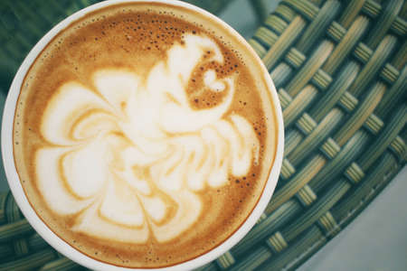 Vintage latte art coffeeの写真素材
