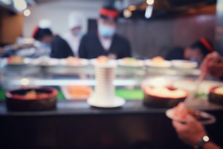 Blurred of japanese chef in restaurantの写真素材