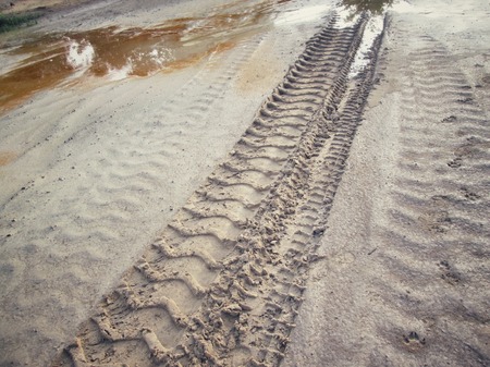 Wheel tracks on the soil.の写真素材