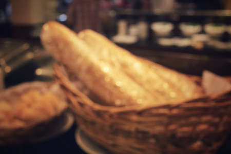Blurred of fresh bread at bakery shopの写真素材