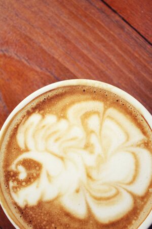 Vintage latte art coffeeの写真素材