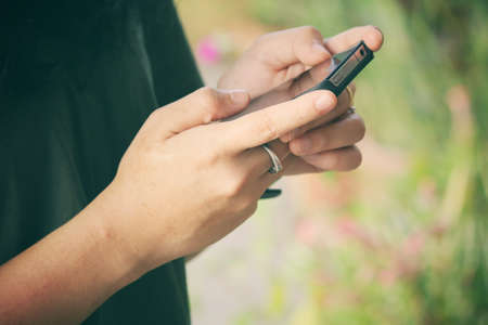 Woman using smart phoneの写真素材