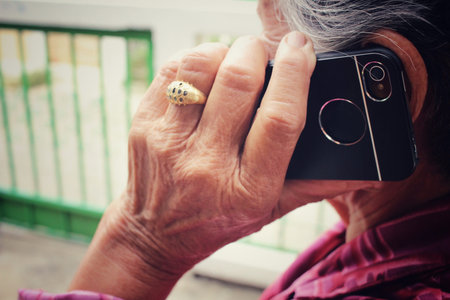 Portrait of senior women talking phone