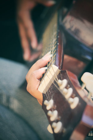 Woman playing the guitar