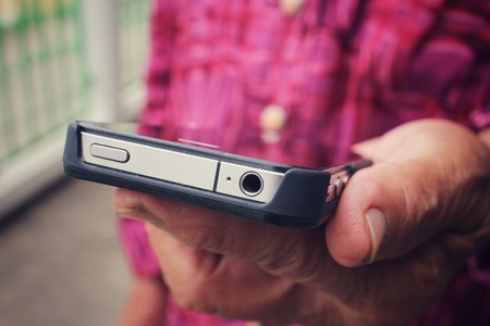 Senior using smart phoneの写真素材