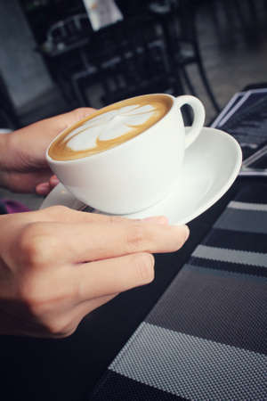 Vintage latte art coffeeの写真素材