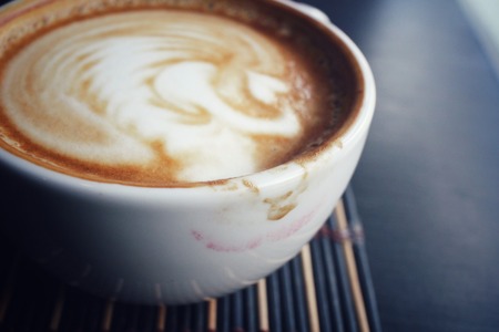 Vintage latte art coffeeの写真素材