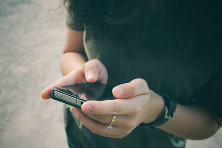 Woman using smart phoneの写真素材