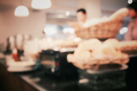 Blurred of fresh bread at bakery shopの写真素材