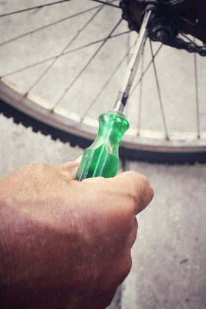 Repair of a bicycleの写真素材