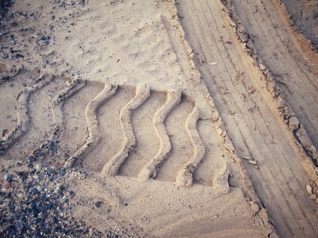 Wheel tracks on the soil.の写真素材
