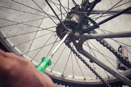 Repair of a bicycleの写真素材