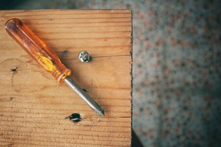 Screwdriver with screwの写真素材