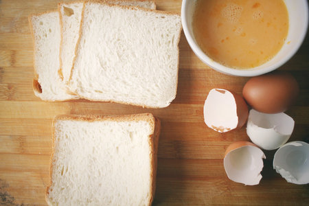 Eggs in a bowl with bread