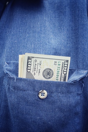 Dollars in jean pocketの写真素材