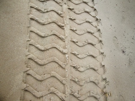 Wheel tracks on the soil.の写真素材