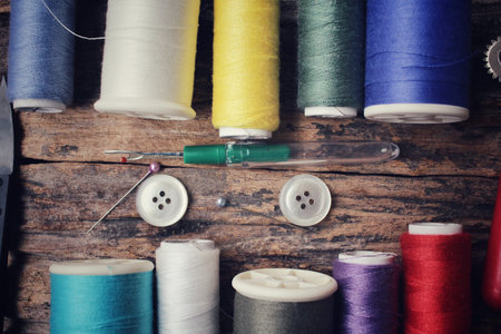 Bobbins colorful threads ,scissors and tool