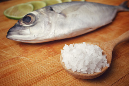 Fresh raw fish ,lemon and salt