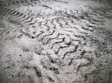 Wheel tracks on the soil.の写真素材