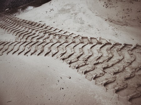 Wheel tracks on the soil.の写真素材