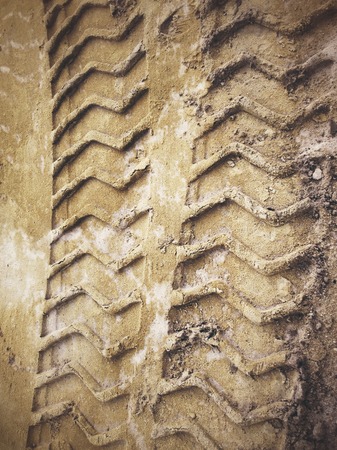 Wheel tracks on the soil.の写真素材