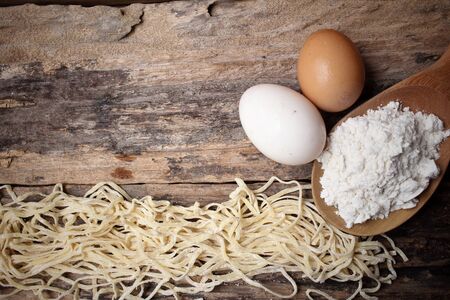 Making noodle with eggs and wheat flourの写真素材