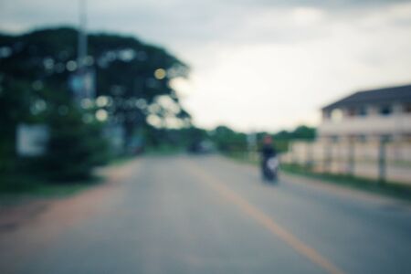Blurred of motorcycle on roadの写真素材