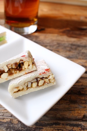 Indian sweets with hot teaの写真素材