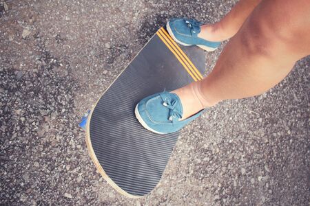 Young girl with skateboardの写真素材
