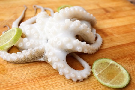 Fresh octopus food with lemonの写真素材