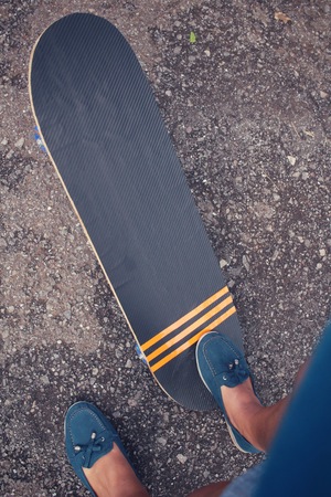 Young girl with skateboardの写真素材