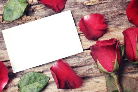 Blank card with red rosesの写真素材
