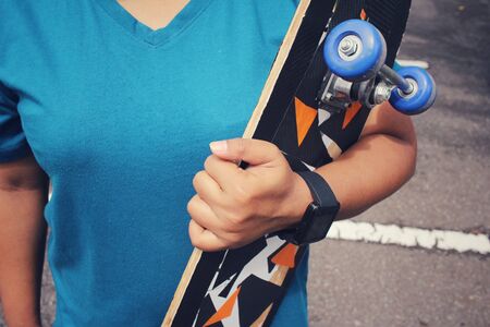 Young girl with skateboardの写真素材