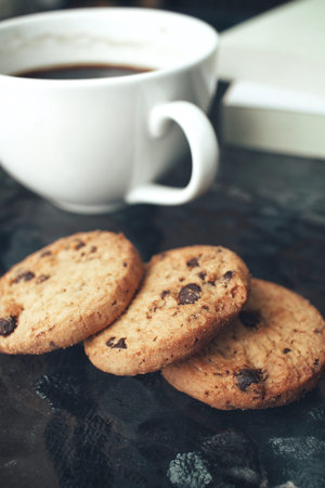 Hot coffee with chocolate cookies