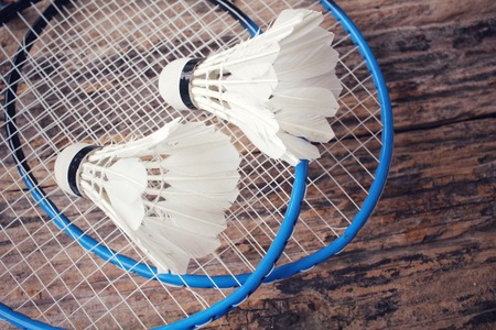 Shuttlecocks with badminton racket.の写真素材