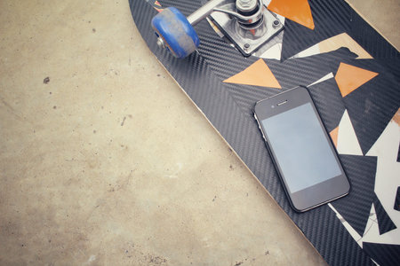 Skateboard with smart phone