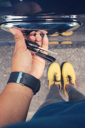 Selfie of shoes with opens the door car