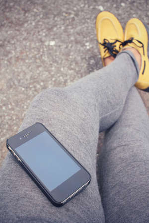 Selfie of shoes with smart phoneの写真素材