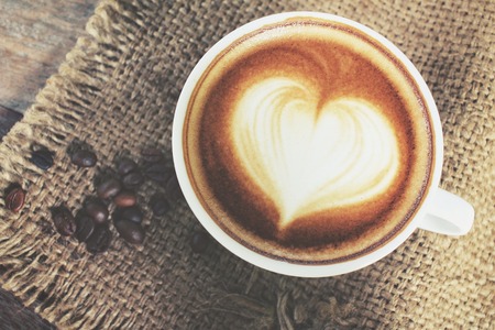 Vintage latte art coffeeの写真素材