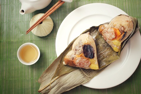 Zongzi with hot teaの写真素材