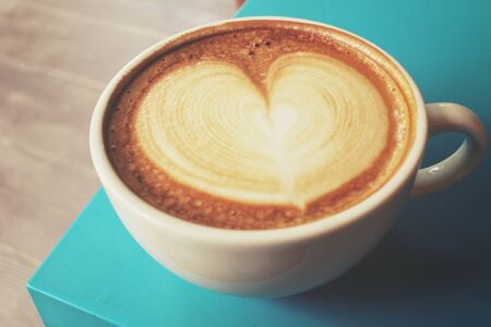 Vintage latte art coffeeの写真素材