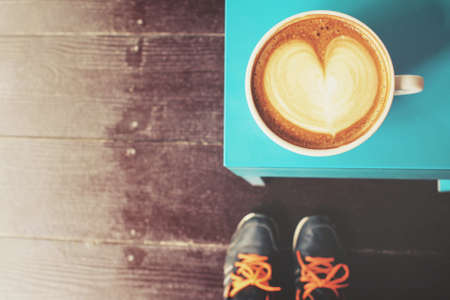 Selfie of coffee with shoesの写真素材