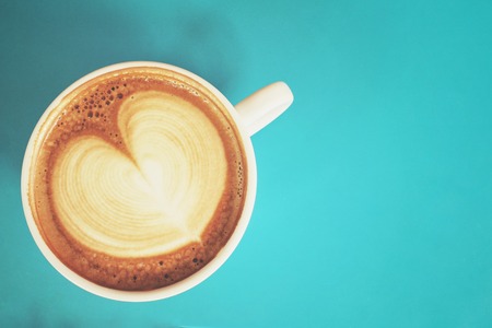 Vintage latte art coffeeの写真素材