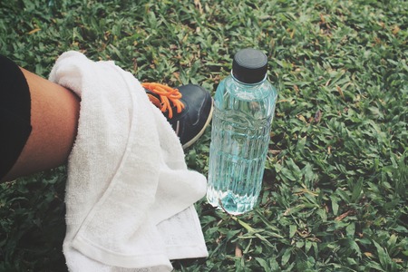 Selfie of sport shoes with water drinkの写真素材