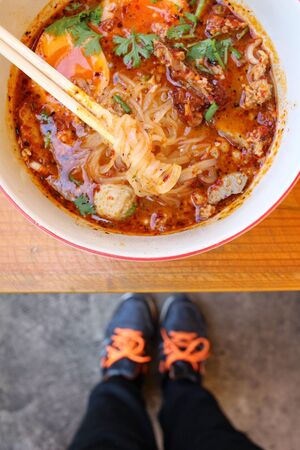 Selfie of shoes with ramenの写真素材